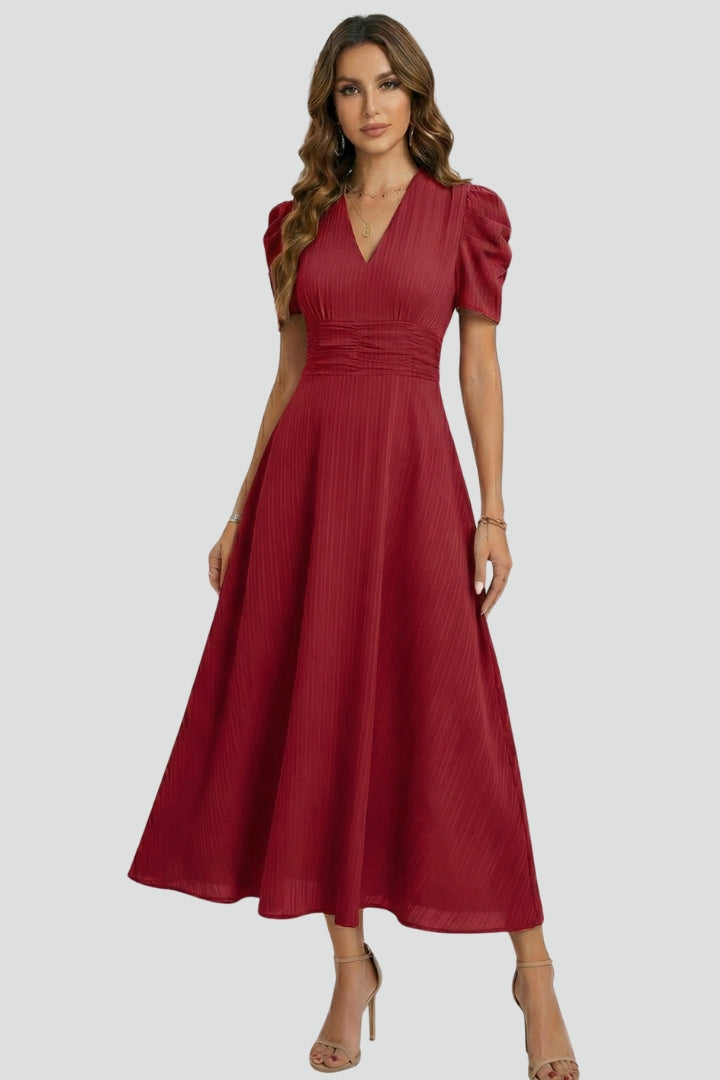 Women's pleated V-neck midi dress with short puff sleeves and gathered waist