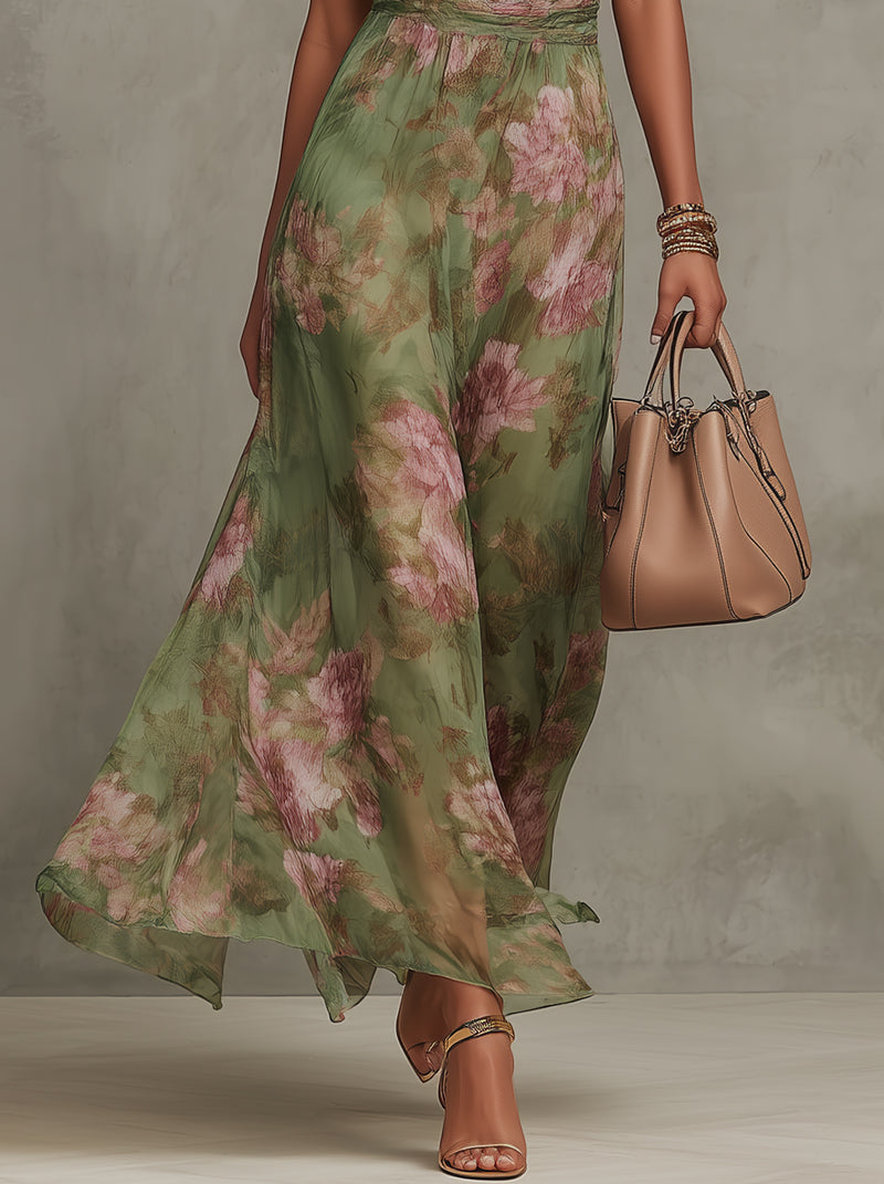 Women's floral halter maxi dress with waist tie and flowing skirt