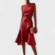 Women's sleeveless draped midi dress with defined waist tie and flared skirt