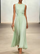 Women's sleeveless ruched waist maxi dress with gathered bodice and flowing ruffled hem