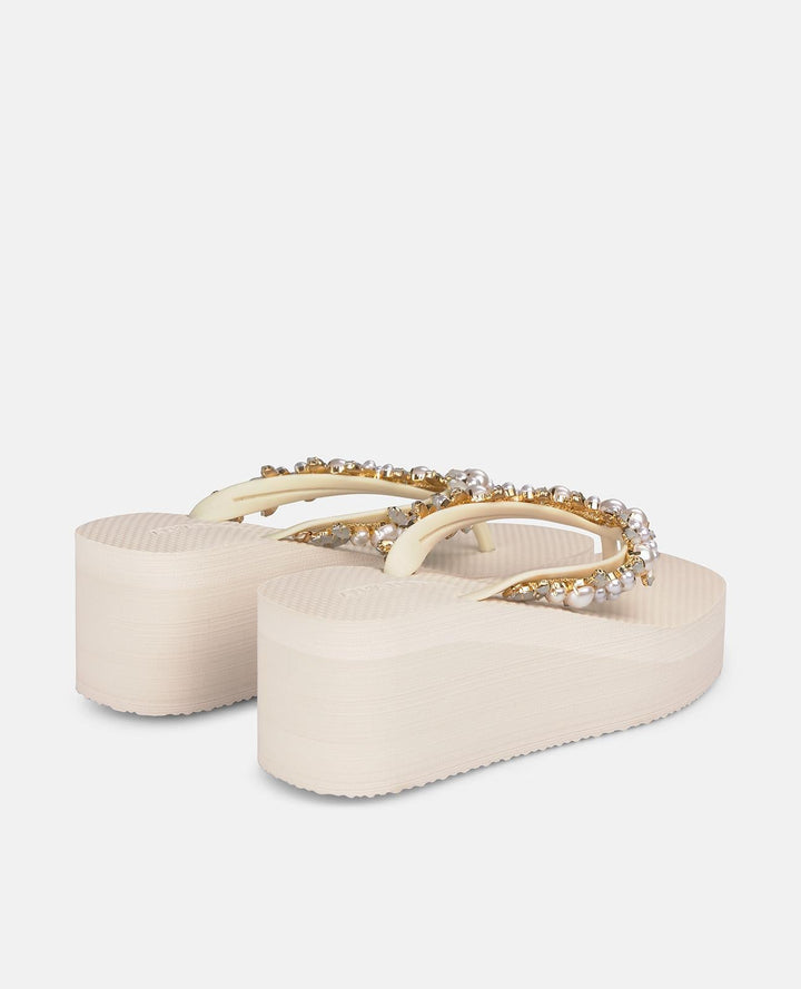 Cream pearl embellished platform flip-flop sandals