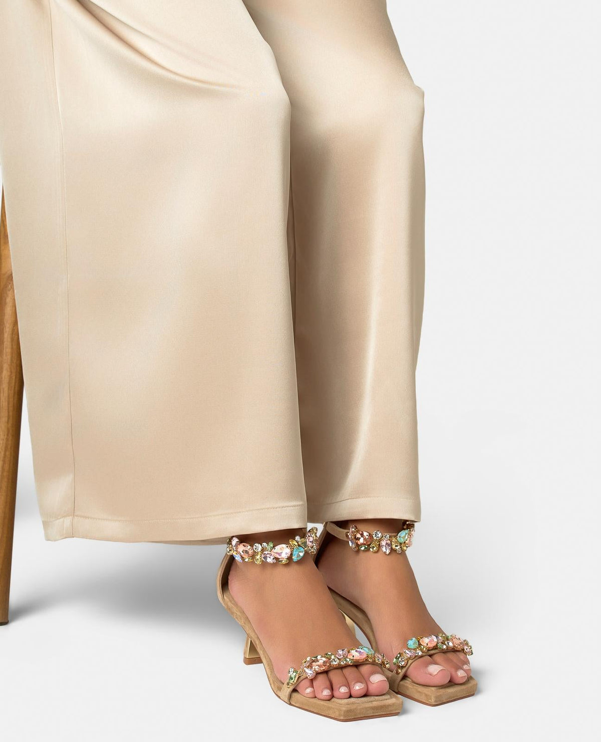 Women's tan embellished open toe sandals with ankle straps and mid heels