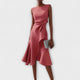 Women's sleeveless draped midi dress with defined waist tie and flared skirt