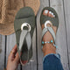 Women's open-toe sandals with crossed straps and circular centre detail