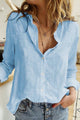 Women's button-down blouse with V-neck collar and long sleeves