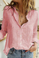 Women's button-down blouse with V-neck collar and long sleeves