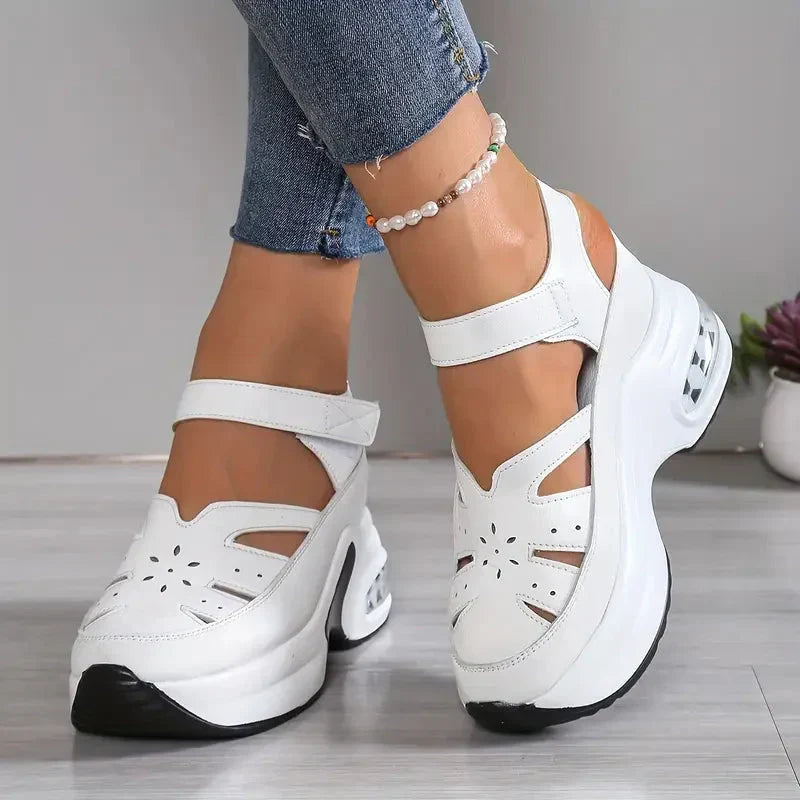 Women's platform sandals with ankle straps and cutout toe detailing