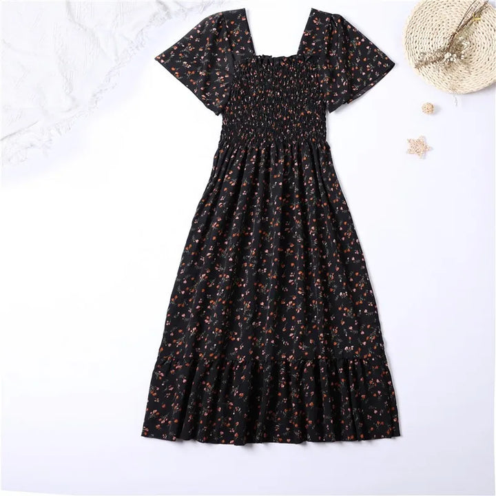 Thea smocked floral midi dress with flutter sleeves