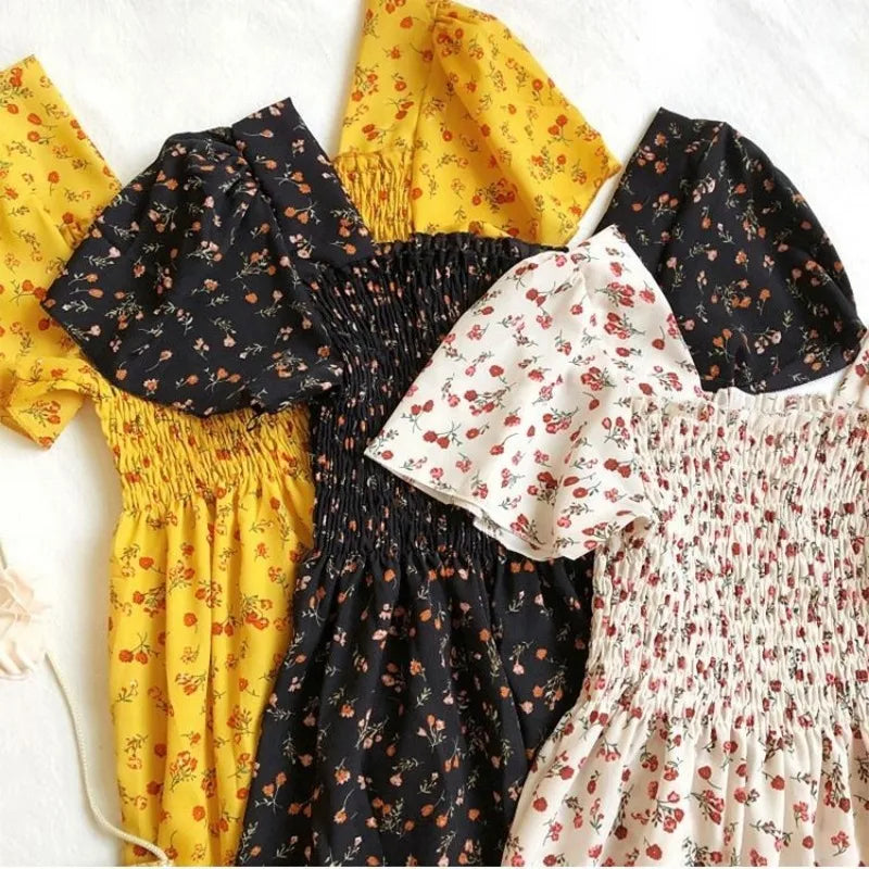 Thea smocked floral midi dress with flutter sleeves