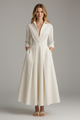 Women's collared midi dress with three-quarter sleeves, waistband and flared skirt