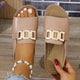 Women's white buckle slide sandals with open toe and flat sole