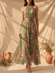 Women's green floral halter maxi dress with defined waist