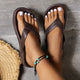 Women's platform toe-post sandals with wide crossing straps